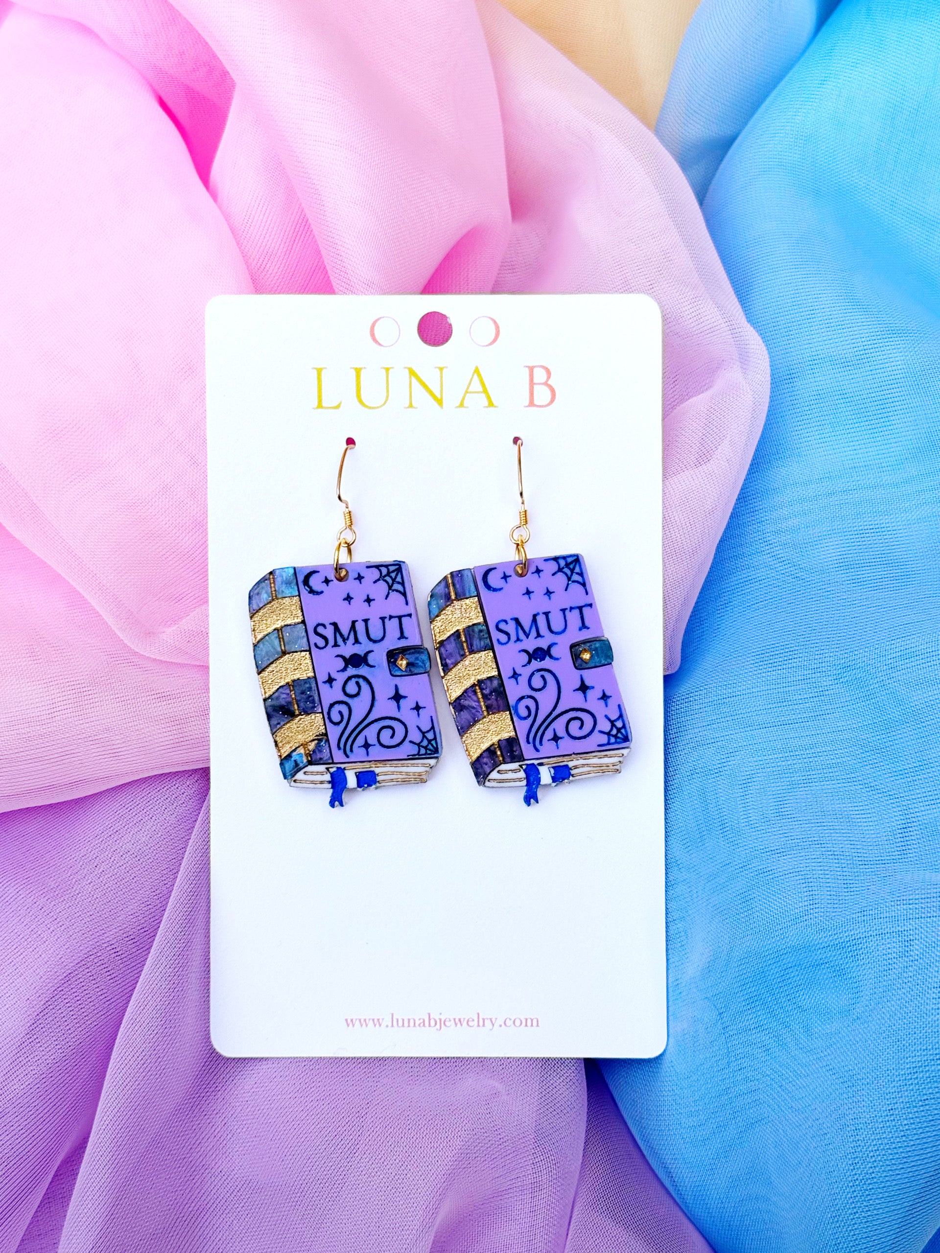 Smut book-shaped acrylic earrings with gold-plated, nickel-free stainless steel hooks, handmade for romance and fantasy readers.