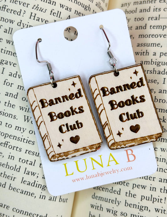 Banned Books Club earrings made from sustainable birch wood with bold laser-cut lettering, perfect for book lovers and free speech advocates.