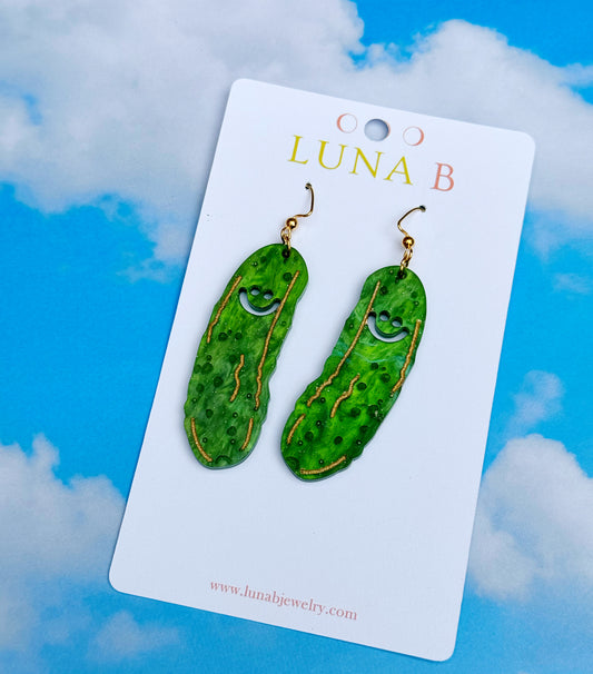 Smiley pickle-shaped acrylic earrings, laser-cut and hand-painted with gold-plated, nickel-free ear wires.