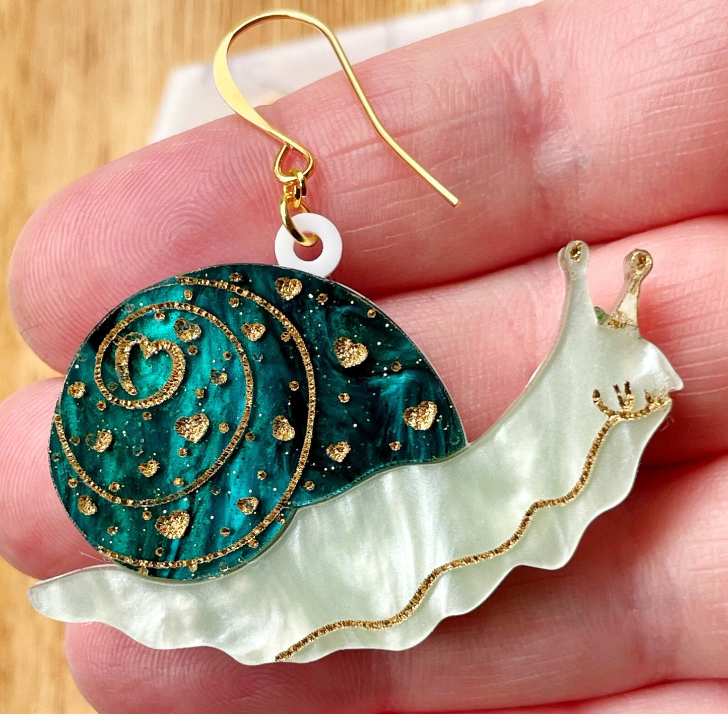 Cosmic Emerald Snail Earrings