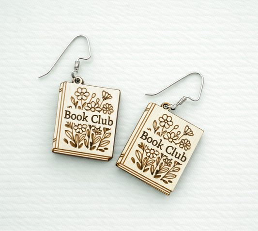 Book Club wooden earrings with floral designs on a white background